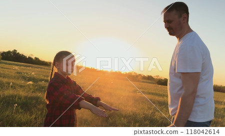 Father protect child with spray against mosquitoes, midges. Man dad spray on child kid daughter protect skin body from bites of mosquitoes, midges. Necessary measures for comfortable pastime in nature Father protect child with spray against mosquitoes, midges. Man dad spray on child kid daughter protect skin body from bites of mosquitoes, midges. Necessary measures for comfortable pastime in nature 118042614