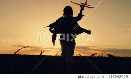 child airplane running through corn field, silhouette child dream airplane pilot, silhouette child running countryside, farm agriculture, child dream flying running field fertile soil, little kid child airplane running through corn field, silhouette child dream airplane pilot, silhouette child running countryside, farm agriculture, child dream flying running field fertile soil, little kid 118042629