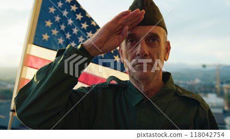 Senior Soldier Stand Against The American Flag For Veterans Day Senior Soldier Stand Against The American Flag For Veterans Day 118042754