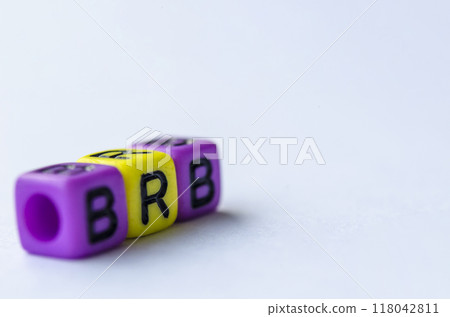BRB text representing Be Right Back on small square toy on white background. Break time concept BRB text representing Be Right Back on small square toy on white background. Break time concept 118042811
