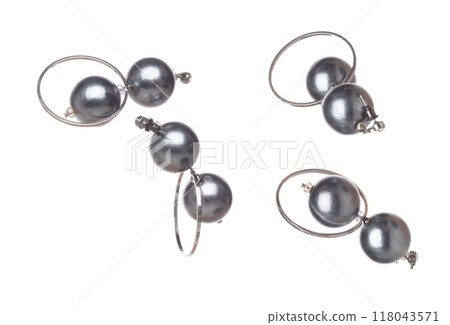Fashion pearl Earrings with beautiful work detail is value. Luxury deep sea pearl diamond earring is fashion trend and fly in air. White background isolated Fashion pearl Earrings with beautiful work detail is value. Luxury deep sea pearl diamond earring is fashion trend and fly in air. White background isolated 118043571