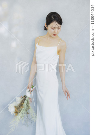 Young woman in a wedding dress Young woman in a wedding dress 118044534