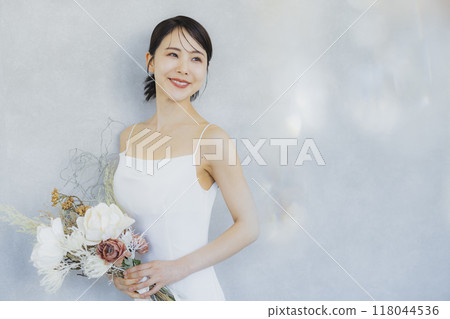 Young woman in a wedding dress Young woman in a wedding dress 118044536