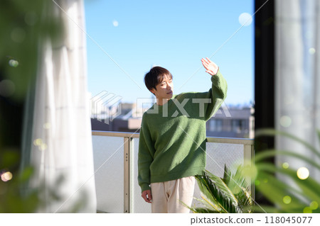 Outdoor men's portrait on the veranda 118045077