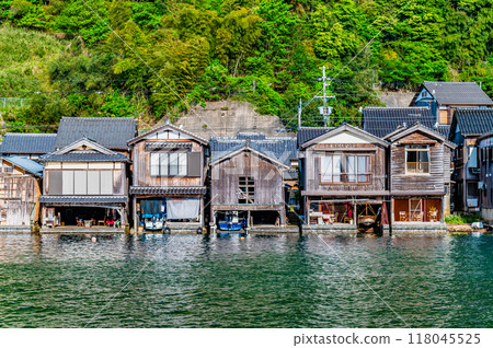 Boathouses in Ine, Kyoto: A group of boathouses lined up along the coast Boathouses in Ine, Kyoto: A group of boathouses lined up along the coast 118045525