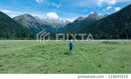 Hiking woman in high altitude mountains 118045828