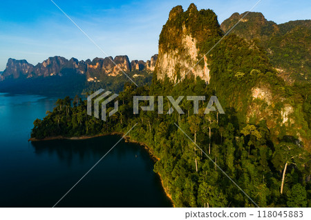 Aerial view Tropical Rainforest trees mountains with reflection on the water 118045883