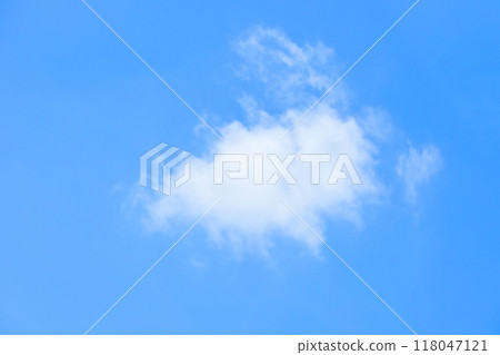beautiful blue sky and white fluffy single cloud with sunrise in the morning, natural background beautiful blue sky and white fluffy single cloud with sunrise in the morning, natural background 118047121