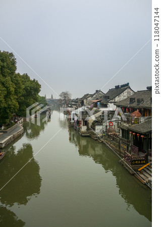 Xitang Ancient Town - View from Yongning Bridge to Huanxiu Bridge (China-Xitang) Xitang Ancient Town - View from Yongning Bridge to Huanxiu Bridge (China-Xitang) 118047144