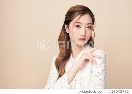 Beautiful young asian woman with clean fresh skin on beige background, Face care, Facial treatment, Cosmetology, beauty and spa, Asian women portrait. 118048732