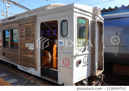 The Nichinan Line tourist express train "Umisaki Sansaki" stopped at Miyazaki Station, with its wooden sides The Nichinan Line tourist express train "Umisaki Sansaki" stopped at Miyazaki Station, with its wooden sides 118049741