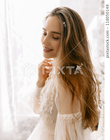 Beauty woman wearing vintage style pastel dress. Smiling young model Beauty woman wearing vintage style pastel dress. Smiling young model 118050149
