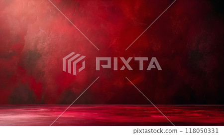 A textured red background with a reflective surface illuminated by soft lighting creating a dramatic atmosphere for artistic projects 118050331