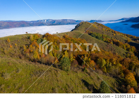 Aerial view of autumn countryside landscape in a misty morning Aerial view of autumn countryside landscape in a misty morning 118051812