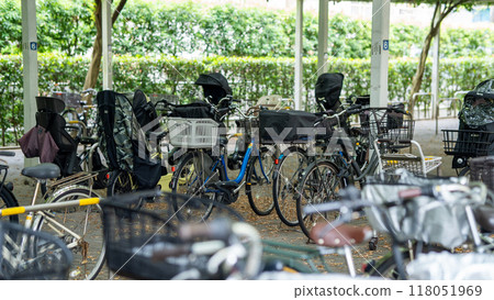 Bicycle parked in a bicycle parking lot Bicycle parked in a bicycle parking lot 118051969
