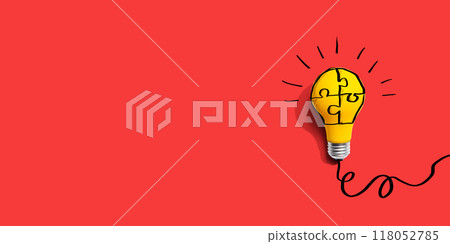 Jigsaw puzzle with a yellow light bulb 118052785