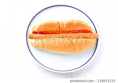 Chorizo sausage bun (hot dog) with mustard and ketchup 118053113