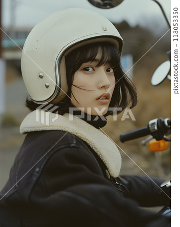 Asian woman riding a motorbike 118053350