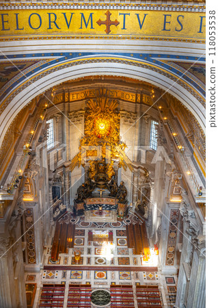 The majestic apse of St. Peter's Basilica features the Cathedra of St. Peter, upheld by four Doctors of the Church, showcasing intricate artistry and historical significance. 118053538