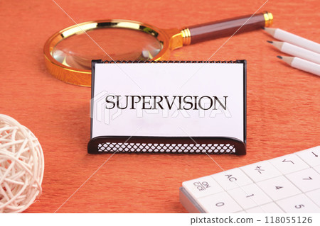 The word supervision. concept of supervision. the action, process, or occupation of supervising. SUPERVISION on a white business card, front view The word supervision. concept of supervision. the action, process, or occupation of supervising. SUPERVISION on a white business card, front view 118055126