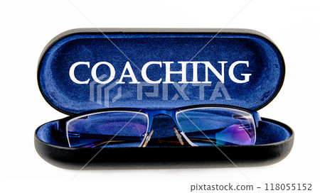 COACHING written on the glasses case on a white background COACHING written on the glasses case on a white background 118055152