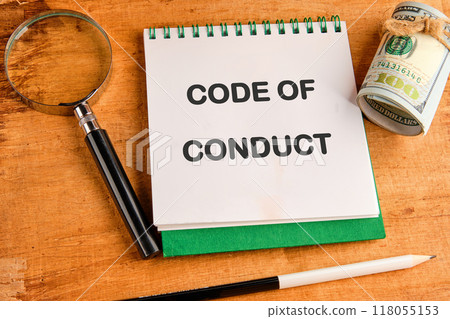 Code of conduct symbol. Business and Code of conduct concept. Copy space. in a notebook on a papyrus background Code of conduct symbol. Business and Code of conduct concept. Copy space. in a notebook on a papyrus background 118055153