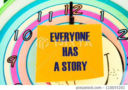 Business, technology, internet concept. EVERYONE HAS A STORY message written on the sticker on the background of the clock face with hands 118055201