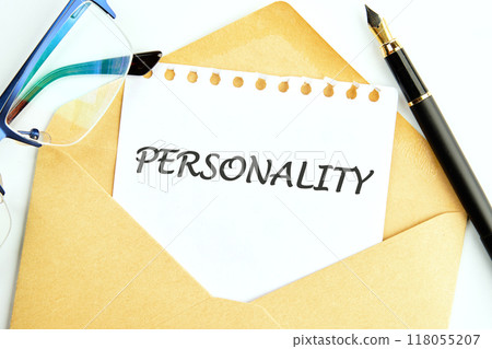 Concept word PERSONALITY on a white sheet of notepad sticking out of an envelope Concept word PERSONALITY on a white sheet of notepad sticking out of an envelope 118055207