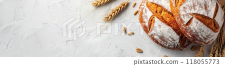 A freshly baked wheat bread loaf with wheat sprouts on a white background. Generative AI 118055773