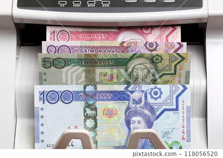 Turkmenistani manat in the counting machine Turkmenistani manat in the counting machine 118056520