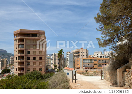 Eerie Landscapes of Spain's Housing Bust: Incomplete Developments and Desolate Neighborhoods Under Vast Skies. Remnants of Spain's Economic Downturn: Unoccupied Homes and Barren Skylines in 118056585