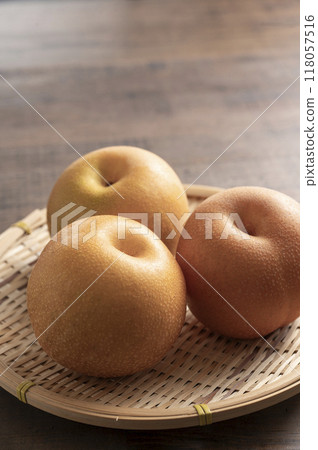 Pears in a colander 118057516