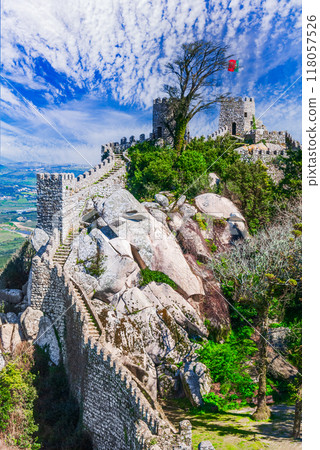 Sintra, Portugal. Aerial top view of medieval moorish Castelo dos Mouros, world heritage place next to Lisbon. Sintra, Portugal. Aerial top view of medieval moorish Castelo dos Mouros, world heritage place next to Lisbon. 118057526