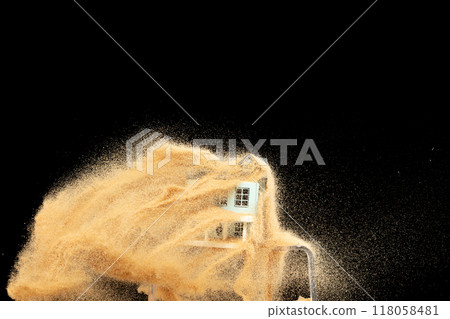 Sand storm hit House as natural disaster from climate change global warming. Strong wind of sand attack house with insurance create loss damage environment. Black background isolated Sand storm hit House as natural disaster from climate change global warming. Strong wind of sand attack house with insurance create loss damage environment. Black background isolated 118058481