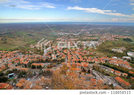 Republic of San Marino surrounded by Italy - The townscape of Borgo Maggiore at the foot of Mount Titano, a World Heritage Site 118058515