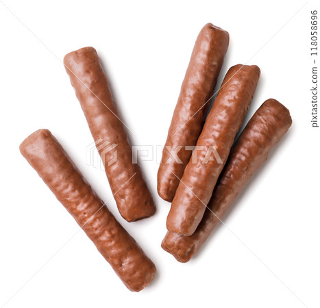 Chocolate sticks on a white background. Top view 118058696