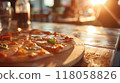 closeup pizza on wooden table in pizzeria restaurant background 118058826