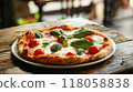 closeup pizza on wooden table with ingredients top view  118058838