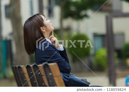 High school girl in the park High school girl in the park 118059824