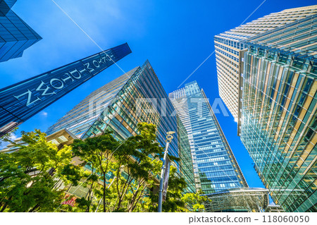 Tokyo cityscape in Japan, with airplanes and Tokyo Midtown standing out against the greenery - September 5th 118060050