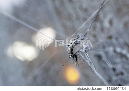 Broken window glass 118060484