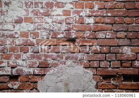 A white brick and orange brick wall. A orange painted old brick wall background 118060961