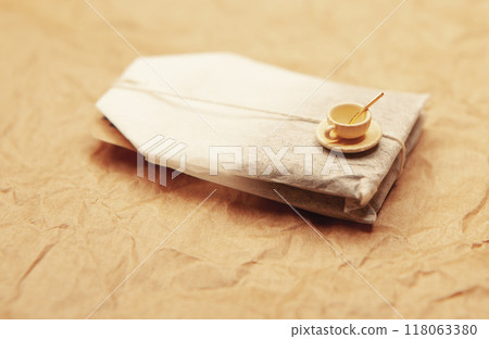 image of tea bag miniature mug paper background 118063380