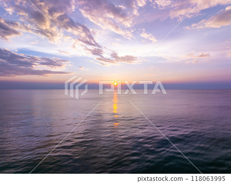 Sunset sky, Nature beautiful Light Sunset or sunrise over sea, Colorful dramatic majestic scenery sky,Amazing clouds and waves in sunset sky nature light cloud background 118063995
