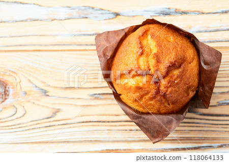Sweet Baked vanilla muffins ( cupcake )  . Top view 118064133