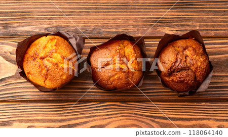 Sweet Baked vanilla muffins ( cupcake ) . Top view Sweet Baked vanilla muffins ( cupcake ) . Top view 118064140