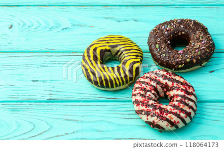 Sweet glazed colorful donuts . Top view Sweet glazed colorful donuts . Top view 118064173