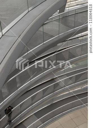 A curved walkway stretches in spirals upwards on top inside the glass dome. A curved walkway stretches in spirals upwards on top inside the glass dome. 118064818