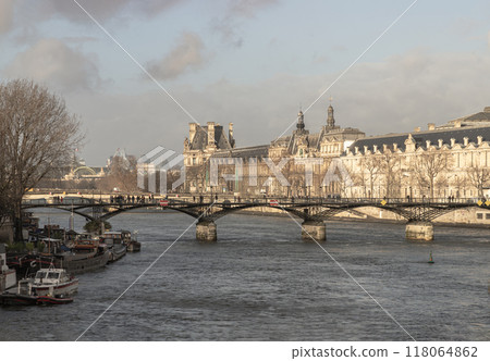 View of The Pont des Arts or Passerelle des Arts is a pedestrian bridge in Paris which crosses the Seine river in Paris. 118064862