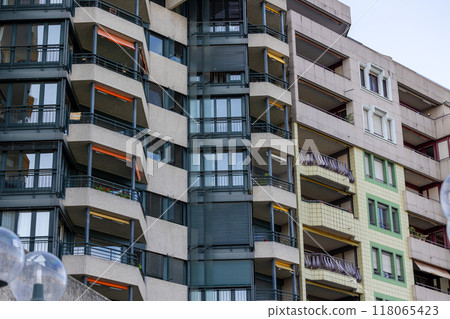 facade of an apartment building. Overpopulation of the world. Many windows facade of an apartment building. Overpopulation of the world. Many windows 118065423